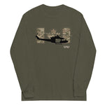 An olive green long-sleeve t-shirt with a graphic on the chest featuring a black helicopter silhouette, a camouflage Canadian maple leaf, and a stylized 'UH' in camouflage, with the text 'hybr' printed below.