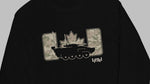 A black long-sleeve crewneck sweatshirt featuring a graphic print on the chest of a black tank silhouette between two camouflage-patterned vertical bars, with a maple leaf above and the text 'IYOH!' below.