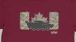 A close-up of a maroon t-shirt featuring a graphic print of a black tank silhouette with a Canadian maple leaf on top, flanked by two camouflage rectangular shapes, with the text 'IYOH' printed below.