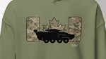 An olive green sweatshirt featuring a graphic print of a black armored vehicle and a maple leaf in front of camouflage-patterned rectangular shapes.
